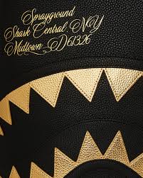 SHARK CENTRAL GOLD BACKPACK